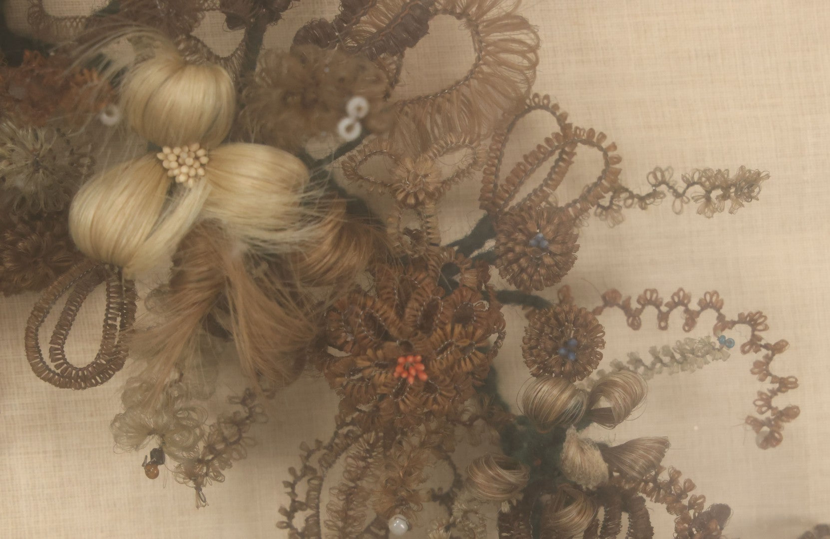 Lot 004 - Antique Victorian Human Hair Work Circular Wreath In Rectangular Shadow Box With Hair Flowers At Center, Fabric Backing, 23-1/8" x 25" x 4-1/2"