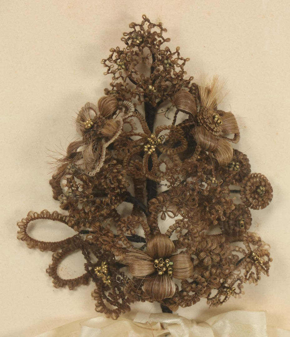 Lot 005 - Antique Victorian Human Hair Work Wreath In Rectangular Shadow Box With White Bow, Center Hair Flower Bouquet, 23-3/4" x 20-3/8" x 3-1/2"