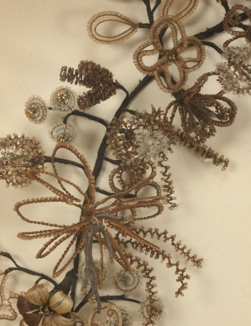 Lot 005 - Antique Victorian Human Hair Work Wreath In Rectangular Shadow Box With White Bow, Center Hair Flower Bouquet, 23-3/4" x 20-3/8" x 3-1/2"