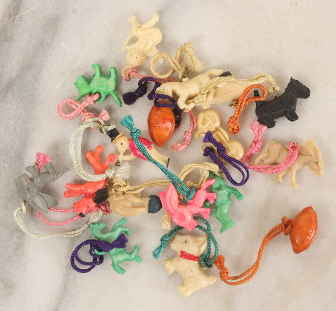 Lot 109 - Grouping Of 15+ Vintage Plastic Celluloid Charm Toys Novelties, Made In Japan, In Box From Gunn's Pharmacy, Uxbridge, Massachusetts, As Found