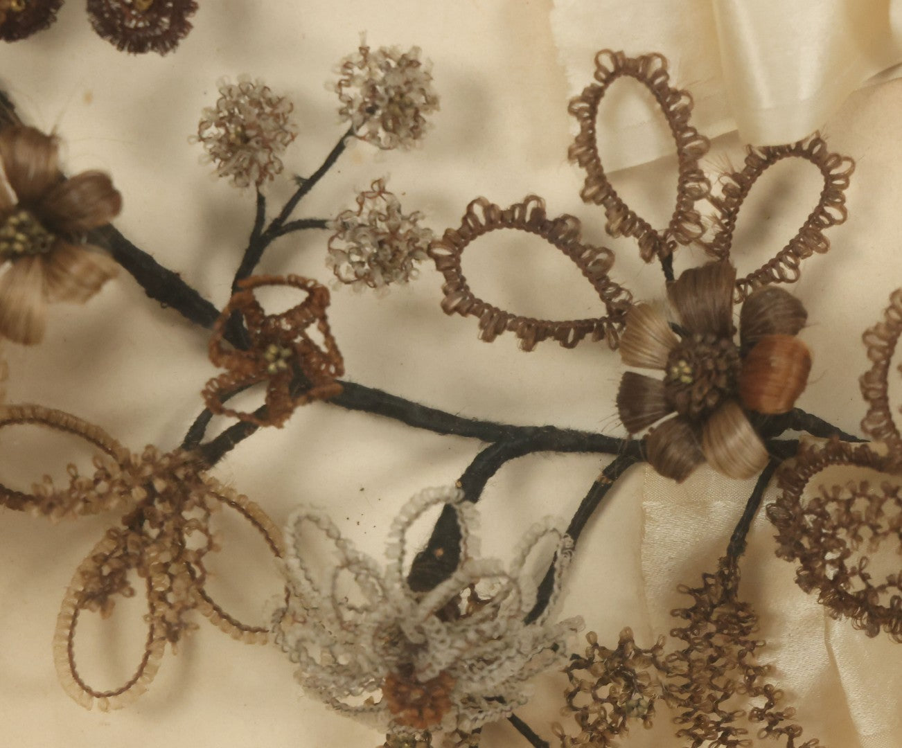 Lot 005 - Antique Victorian Human Hair Work Wreath In Rectangular Shadow Box With White Bow, Center Hair Flower Bouquet, 23-3/4" x 20-3/8" x 3-1/2"