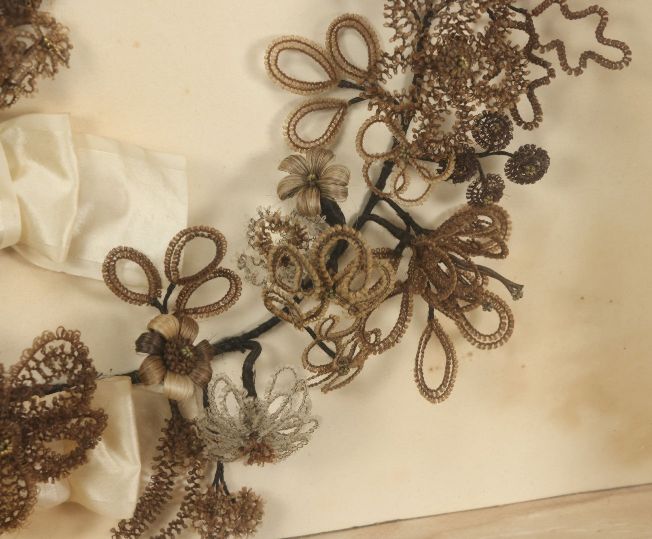 Lot 005 - Antique Victorian Human Hair Work Wreath In Rectangular Shadow Box With White Bow, Center Hair Flower Bouquet, 23-3/4" x 20-3/8" x 3-1/2"