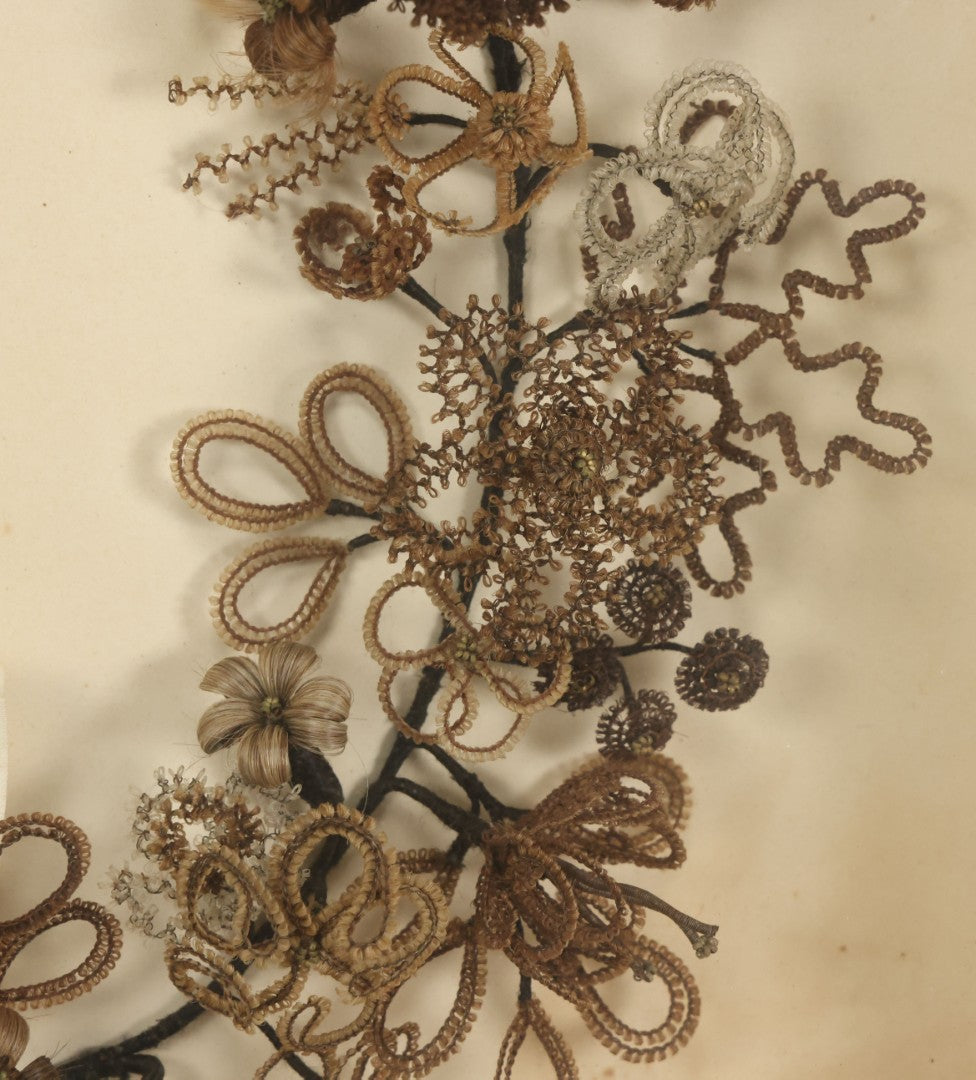 Lot 005 - Antique Victorian Human Hair Work Wreath In Rectangular Shadow Box With White Bow, Center Hair Flower Bouquet, 23-3/4" x 20-3/8" x 3-1/2"