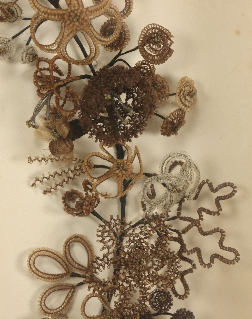 Lot 005 - Antique Victorian Human Hair Work Wreath In Rectangular Shadow Box With White Bow, Center Hair Flower Bouquet, 23-3/4" x 20-3/8" x 3-1/2"