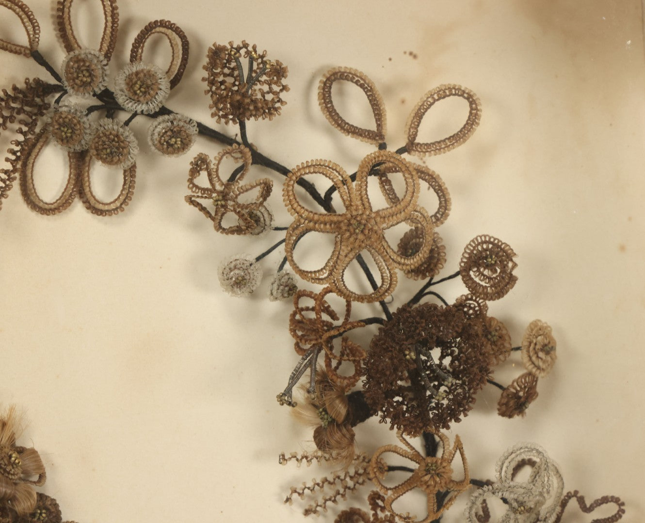 Lot 005 - Antique Victorian Human Hair Work Wreath In Rectangular Shadow Box With White Bow, Center Hair Flower Bouquet, 23-3/4" x 20-3/8" x 3-1/2"