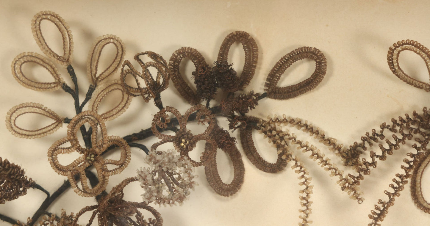 Lot 005 - Antique Victorian Human Hair Work Wreath In Rectangular Shadow Box With White Bow, Center Hair Flower Bouquet, 23-3/4" x 20-3/8" x 3-1/2"