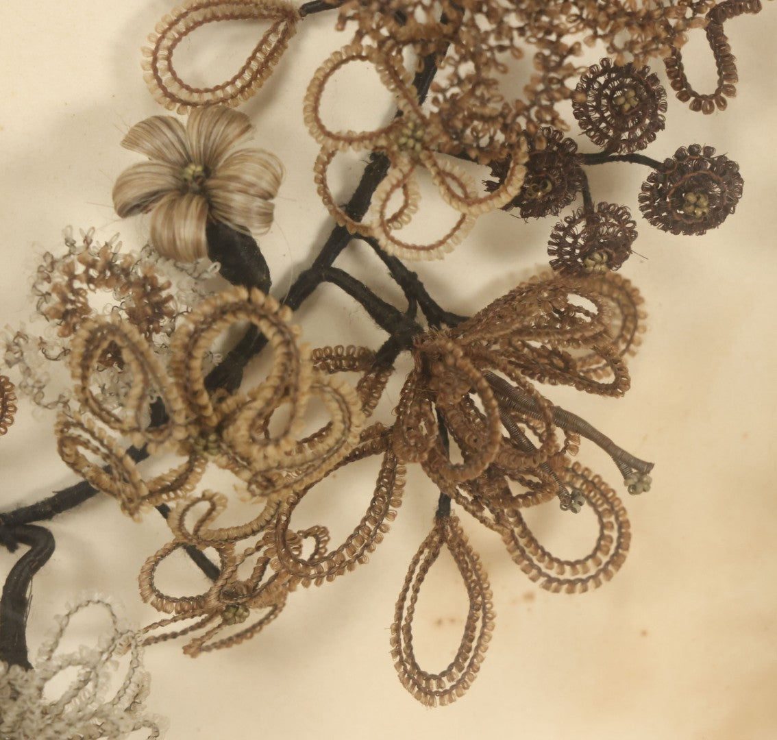 Lot 005 - Antique Victorian Human Hair Work Wreath In Rectangular Shadow Box With White Bow, Center Hair Flower Bouquet, 23-3/4" x 20-3/8" x 3-1/2"