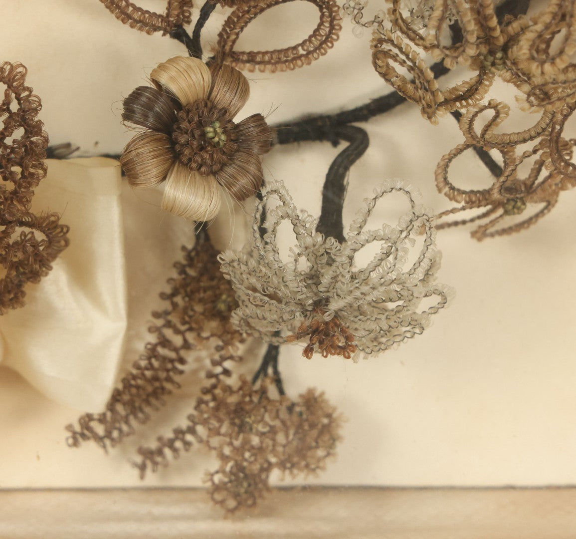 Lot 005 - Antique Victorian Human Hair Work Wreath In Rectangular Shadow Box With White Bow, Center Hair Flower Bouquet, 23-3/4" x 20-3/8" x 3-1/2"