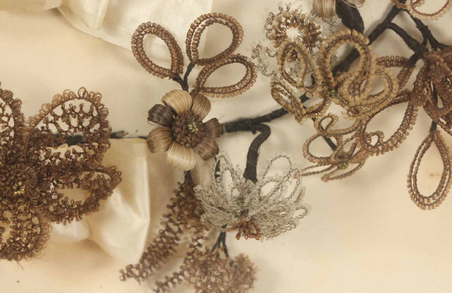 Lot 005 - Antique Victorian Human Hair Work Wreath In Rectangular Shadow Box With White Bow, Center Hair Flower Bouquet, 23-3/4" x 20-3/8" x 3-1/2"