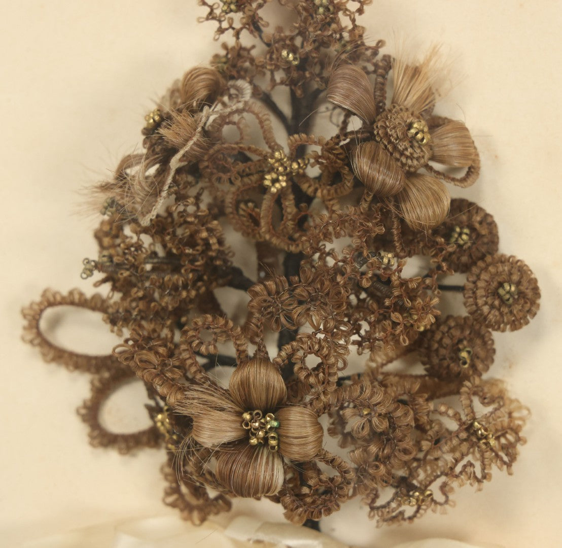 Lot 005 - Antique Victorian Human Hair Work Wreath In Rectangular Shadow Box With White Bow, Center Hair Flower Bouquet, 23-3/4" x 20-3/8" x 3-1/2"
