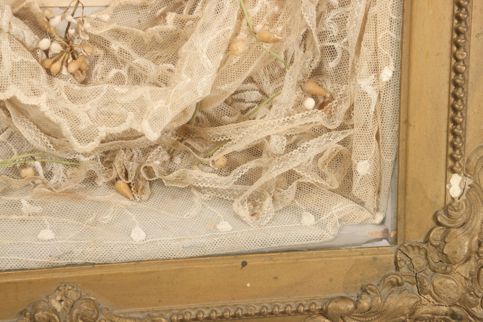 Lot 009 - Antique Victorian Wedding Commemoration Shadow Box With Lace Wedding Veil, Faux Floral Adornments, Cabinet Card Photograph Of Couple At Center, In Gesso Frame, 20-1/2" x 24-1/2" x 3-3/4"