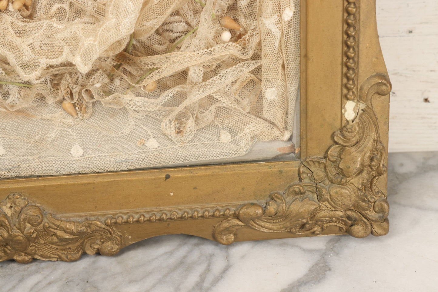 Lot 009 - Antique Victorian Wedding Commemoration Shadow Box With Lace Wedding Veil, Faux Floral Adornments, Cabinet Card Photograph Of Couple At Center, In Gesso Frame, 20-1/2" x 24-1/2" x 3-3/4"
