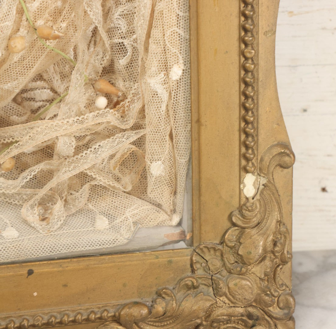 Lot 009 - Antique Victorian Wedding Commemoration Shadow Box With Lace Wedding Veil, Faux Floral Adornments, Cabinet Card Photograph Of Couple At Center, In Gesso Frame, 20-1/2" x 24-1/2" x 3-3/4"