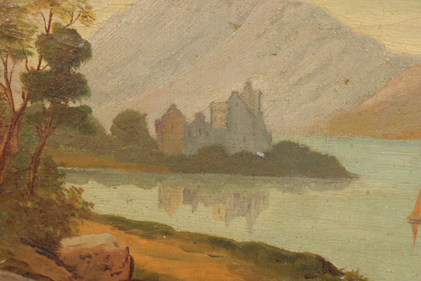 Lot 014 - Antique Oil On Canvas Painting Of A Mountainside Lake Scene With Sailboats, Building At Foot Of Mountain, Likely European, Unsigned, Circa  Mid 19th Century, 17" x 13"