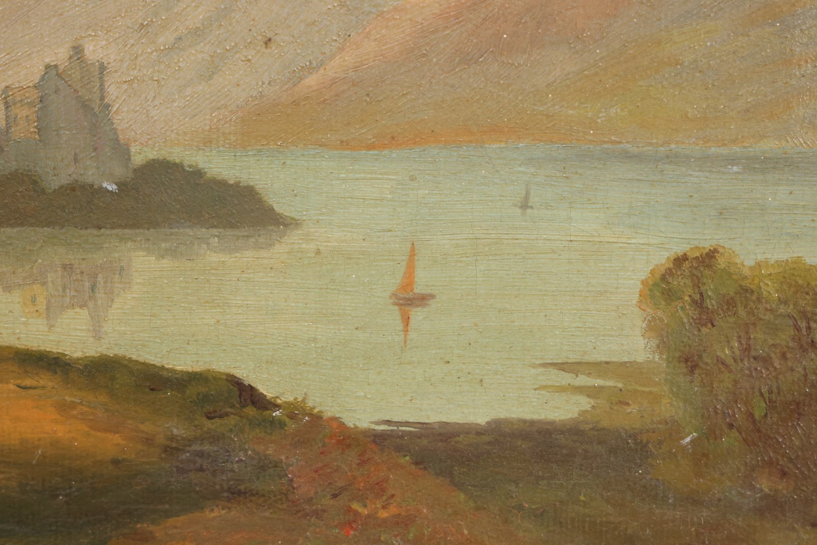 Lot 014 - Antique Oil On Canvas Painting Of A Mountainside Lake Scene With Sailboats, Building At Foot Of Mountain, Likely European, Unsigned, Circa  Mid 19th Century, 17" x 13"