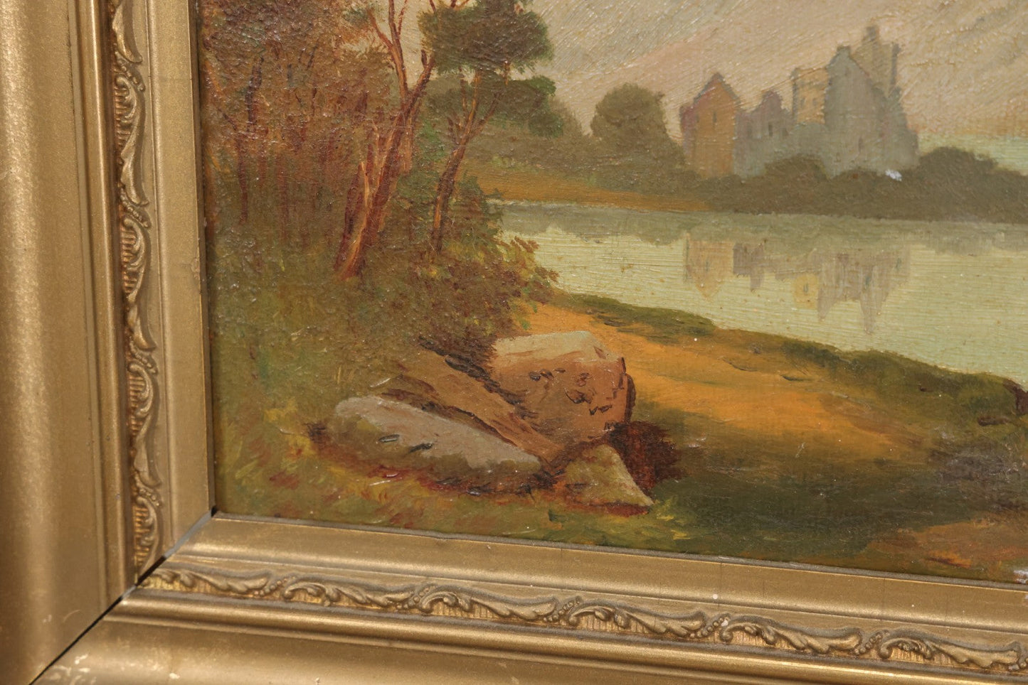 Lot 014 - Antique Oil On Canvas Painting Of A Mountainside Lake Scene With Sailboats, Building At Foot Of Mountain, Likely European, Unsigned, Circa  Mid 19th Century, 17" x 13"