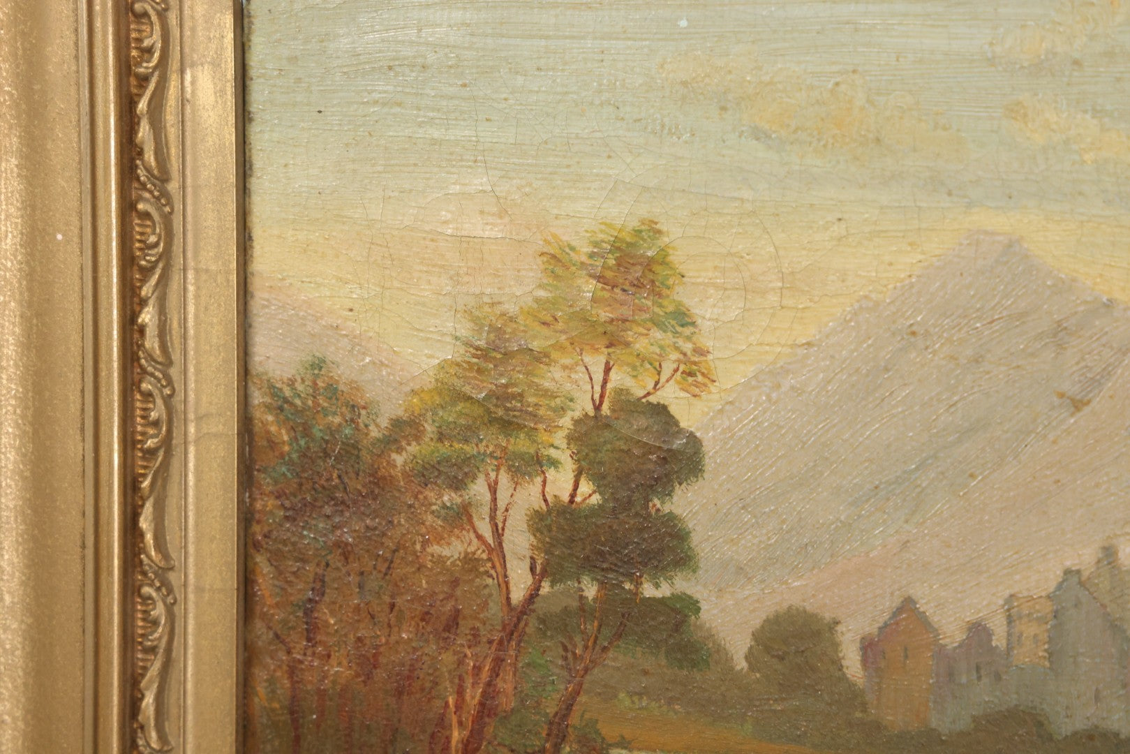 Lot 014 - Antique Oil On Canvas Painting Of A Mountainside Lake Scene With Sailboats, Building At Foot Of Mountain, Likely European, Unsigned, Circa  Mid 19th Century, 17" x 13"