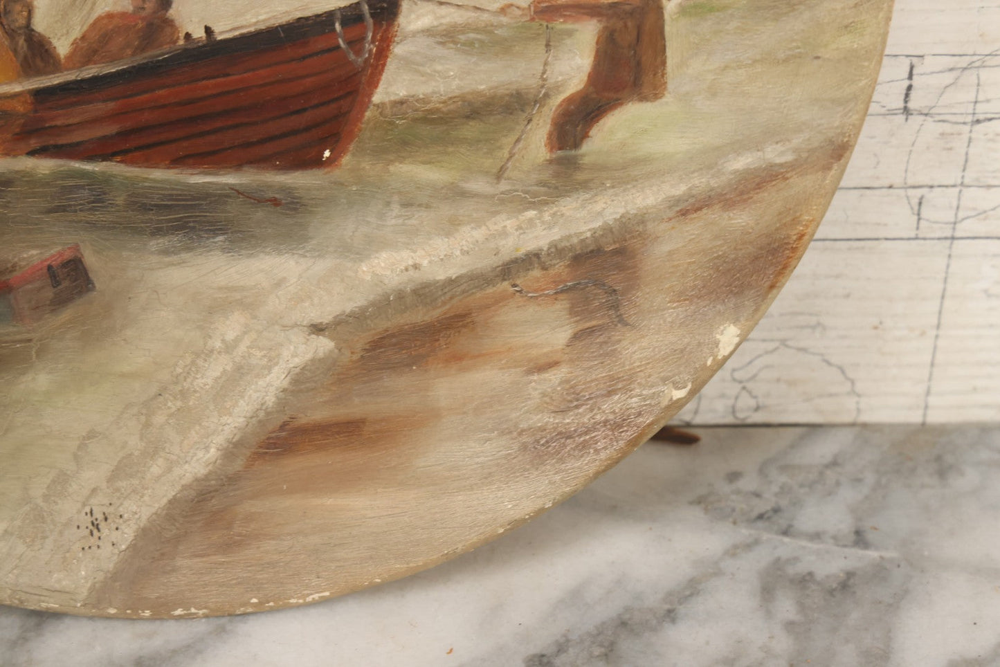 Lot 015 - Antique Painting On Composition Charger, Nautical Scene With Fishermen Arriving At Shore In Dinghy, Tall Ship In Distance, 12" Diameter, Paper Label On Verso, Circa 1880s Note Small Loss At Center Above Horizon