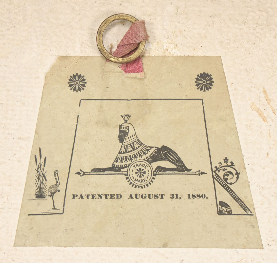 Lot 015 - Antique Painting On Composition Charger, Nautical Scene With Fishermen Arriving At Shore In Dinghy, Tall Ship In Distance, 12" Diameter, Paper Label On Verso, Circa 1880s Note Small Loss At Center Above Horizon