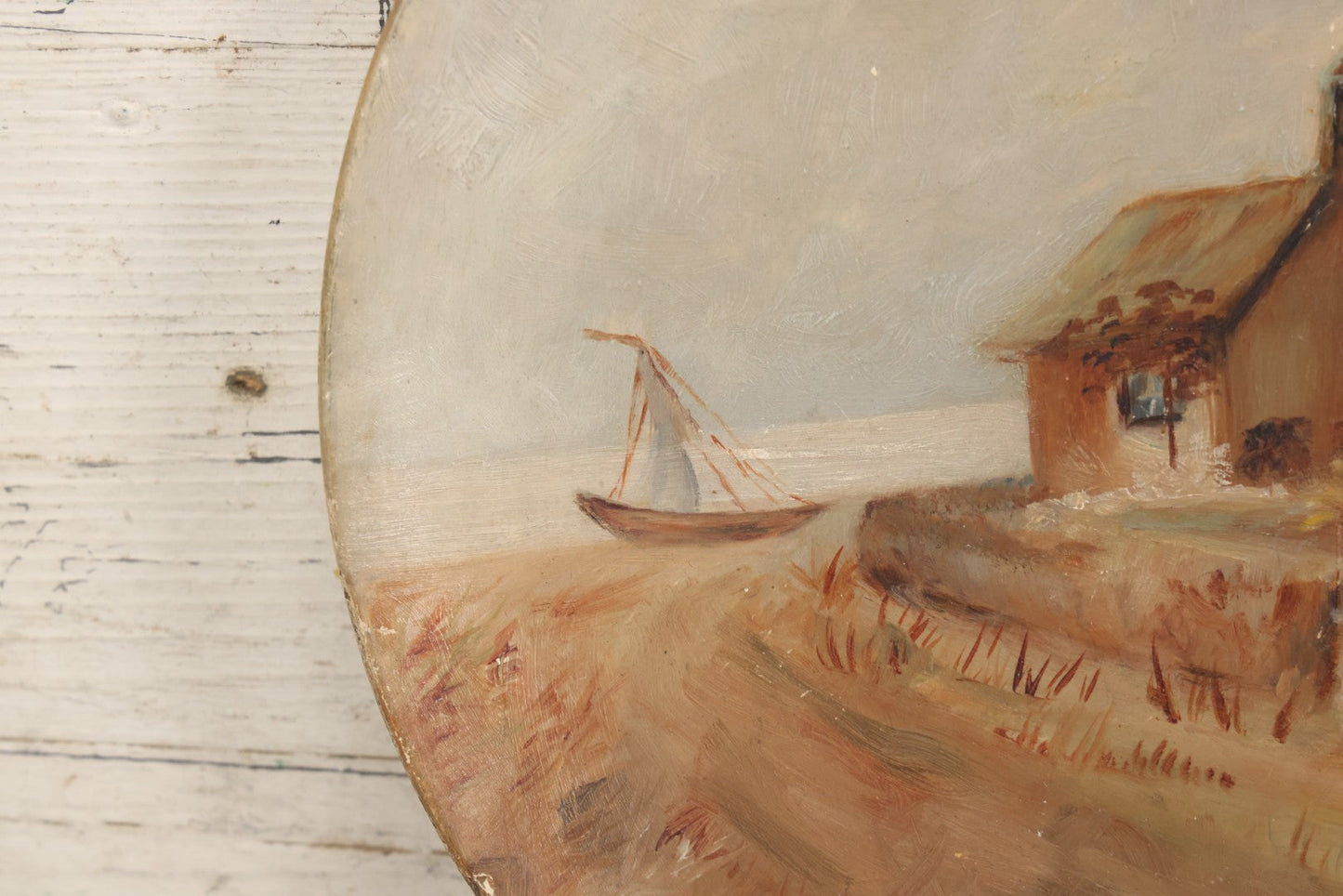 Lot 016 - Antique Painting On Composition Charger, Nautical Scene Seaside Town, Sailboat On Shore, 12" Diameter, Paper Label On Verso, Circa 1880s, Note Pinhole At Center, Missing Hanging Hook On Verso