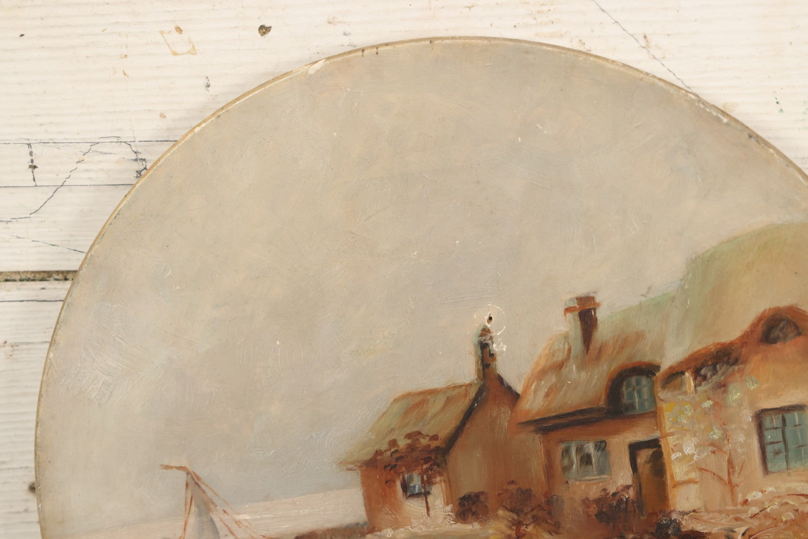 Lot 016 - Antique Painting On Composition Charger, Nautical Scene Seaside Town, Sailboat On Shore, 12" Diameter, Paper Label On Verso, Circa 1880s, Note Pinhole At Center, Missing Hanging Hook On Verso