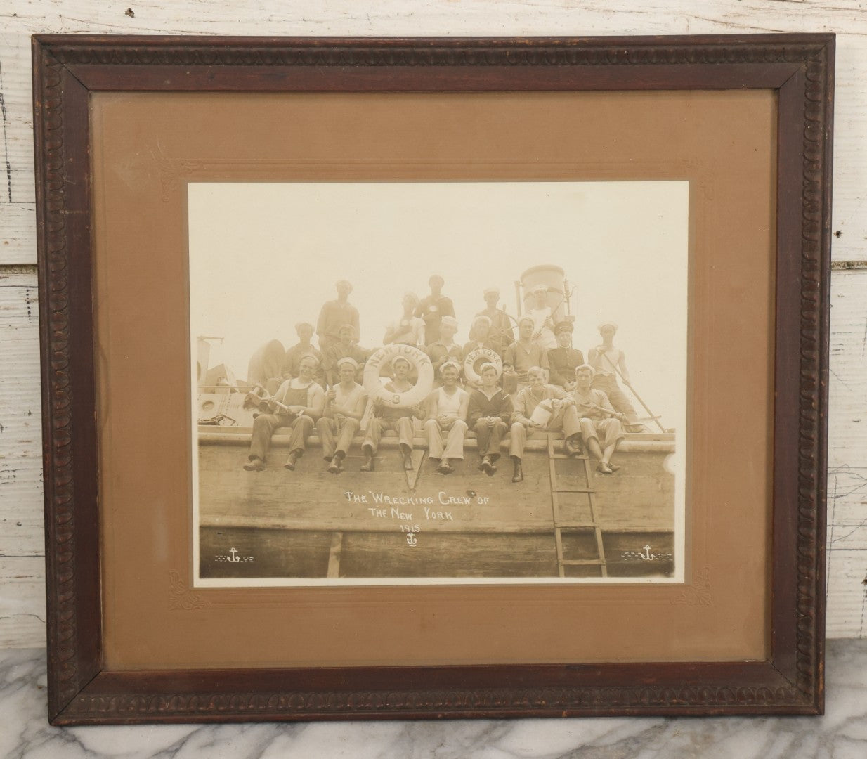 Lot 020 - Antique Boarded Photograph In Frame Of "The 'Wrecking Crew' Of The New York," 1915, Occupational Photos Of Navy Sailors Posing On Ship, With Tools Of The Trade, U.S.S. New York (BB-34), 15-5/8" x 13-5/8"