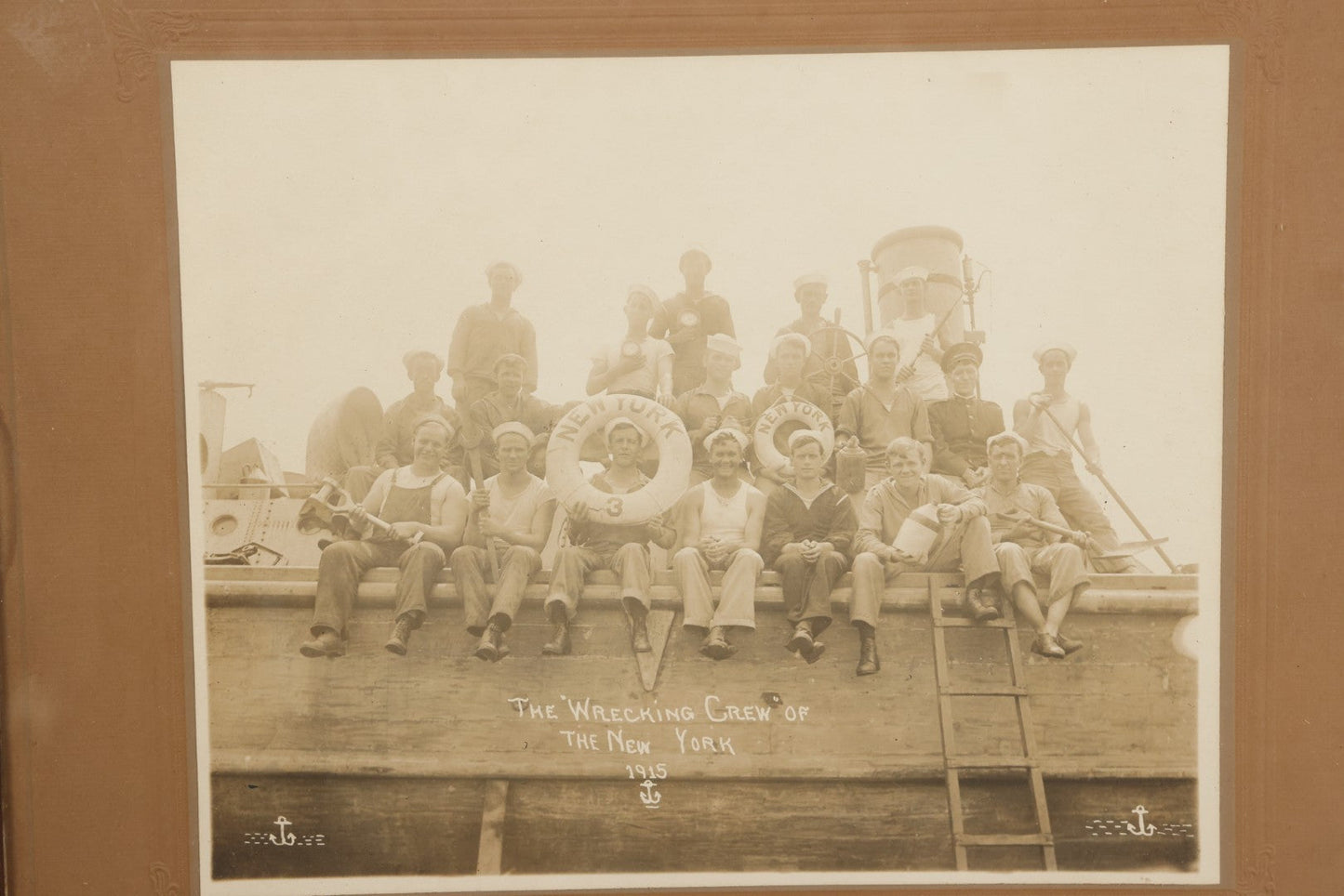 Lot 020 - Antique Boarded Photograph In Frame Of "The 'Wrecking Crew' Of The New York," 1915, Occupational Photos Of Navy Sailors Posing On Ship, With Tools Of The Trade, U.S.S. New York (BB-34), 15-5/8" x 13-5/8"