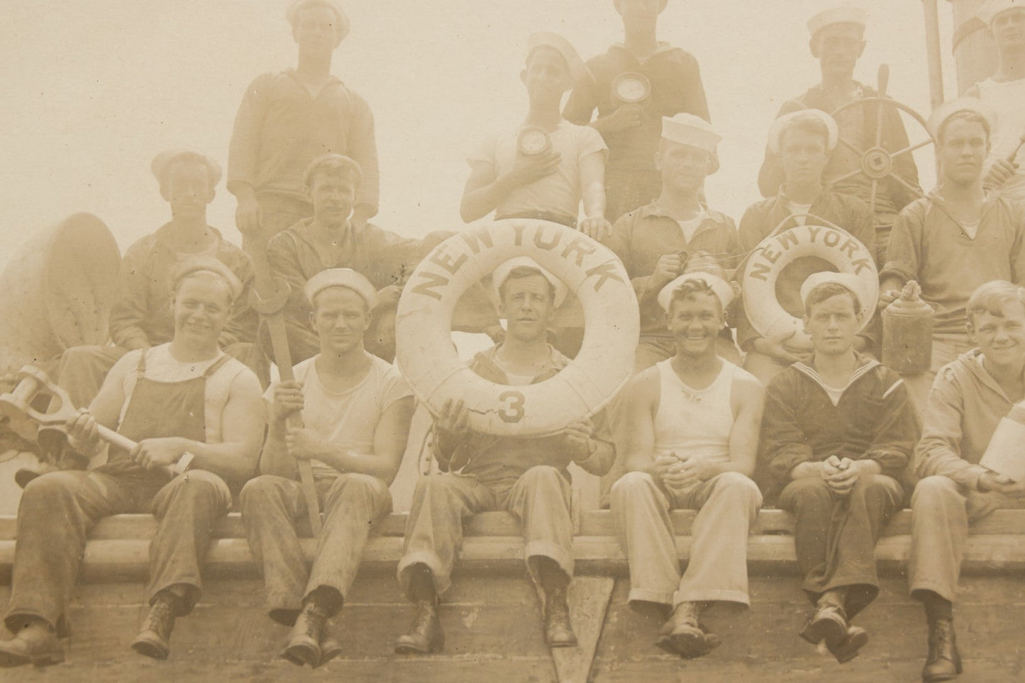 Lot 020 - Antique Boarded Photograph In Frame Of "The 'Wrecking Crew' Of The New York," 1915, Occupational Photos Of Navy Sailors Posing On Ship, With Tools Of The Trade, U.S.S. New York (BB-34), 15-5/8" x 13-5/8"