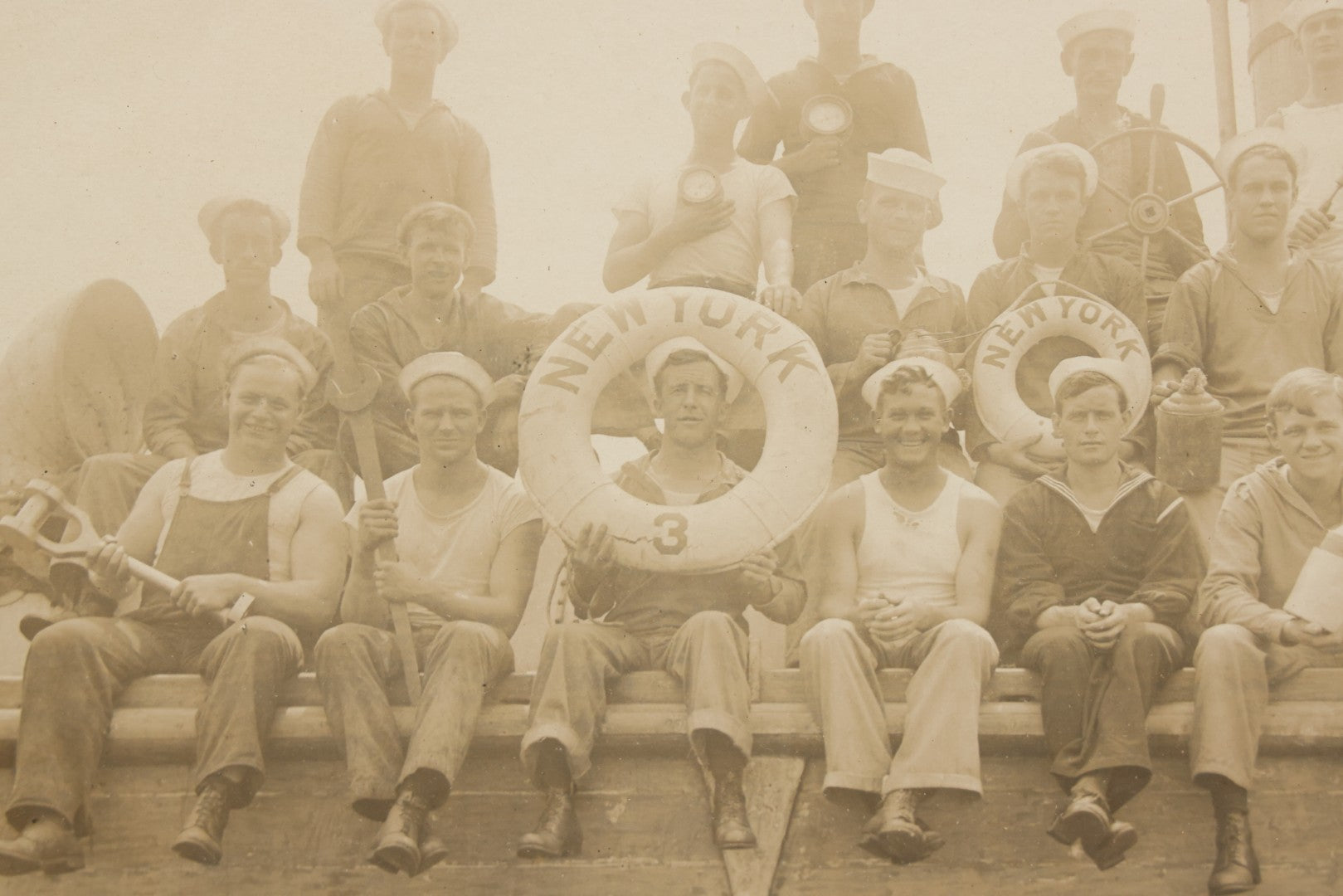 Lot 020 - Antique Boarded Photograph In Frame Of "The 'Wrecking Crew' Of The New York," 1915, Occupational Photos Of Navy Sailors Posing On Ship, With Tools Of The Trade, U.S.S. New York (BB-34), 15-5/8" x 13-5/8"