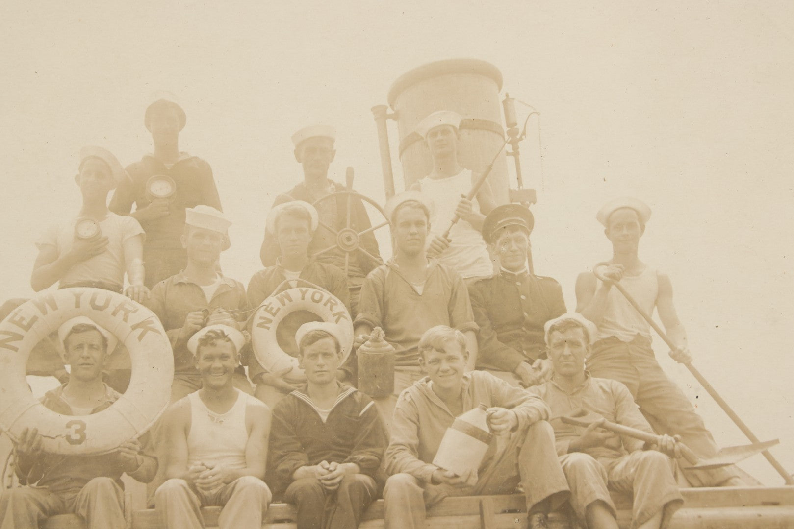 Lot 020 - Antique Boarded Photograph In Frame Of "The 'Wrecking Crew' Of The New York," 1915, Occupational Photos Of Navy Sailors Posing On Ship, With Tools Of The Trade, U.S.S. New York (BB-34), 15-5/8" x 13-5/8"