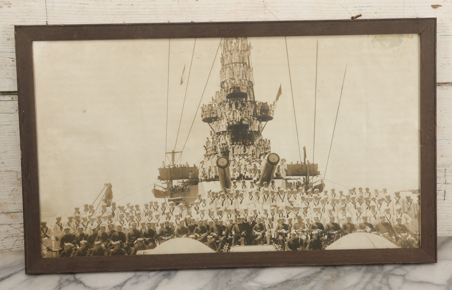 Lot 021 - Antique Framed Photograph Of The Crew Of A U.S. Navy Battleship With Sailors And Officers On Deck, With Gun Turret, 20-1/2" x 12-1/4"