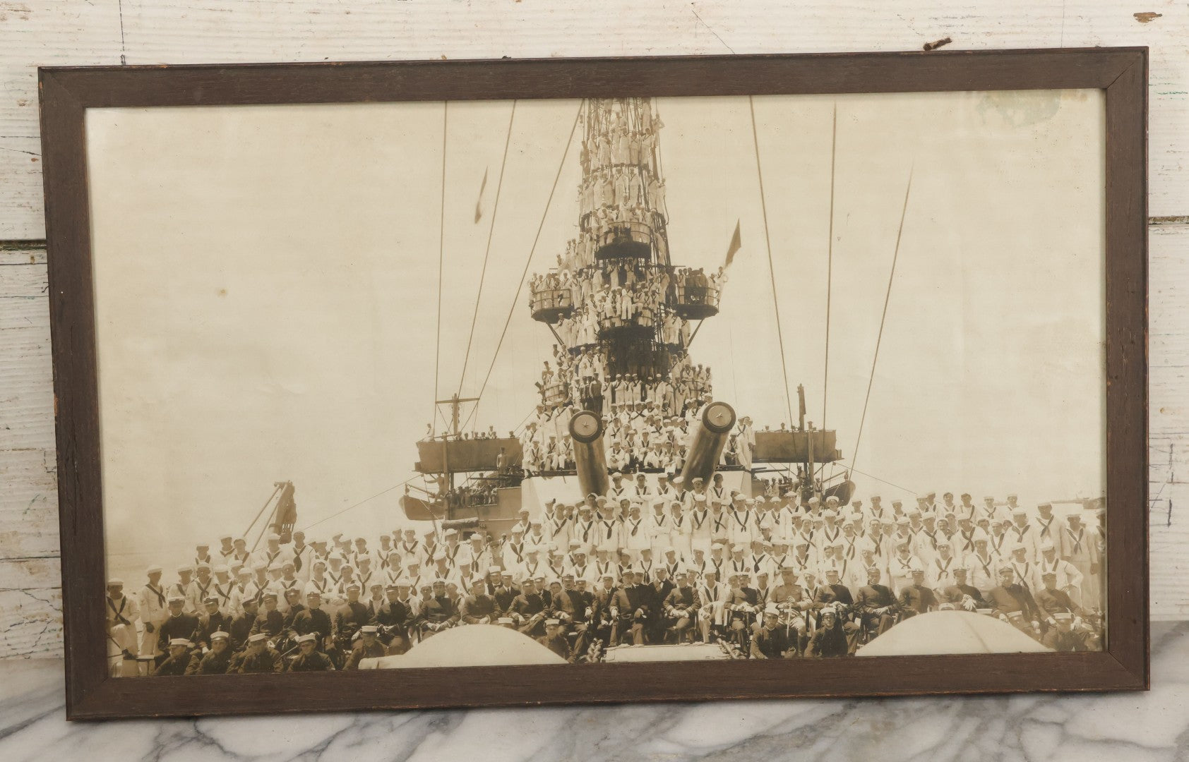 Lot 021 - Antique Framed Photograph Of The Crew Of A U.S. Navy Battleship With Sailors And Officers On Deck, With Gun Turret, 20-1/2" x 12-1/4"