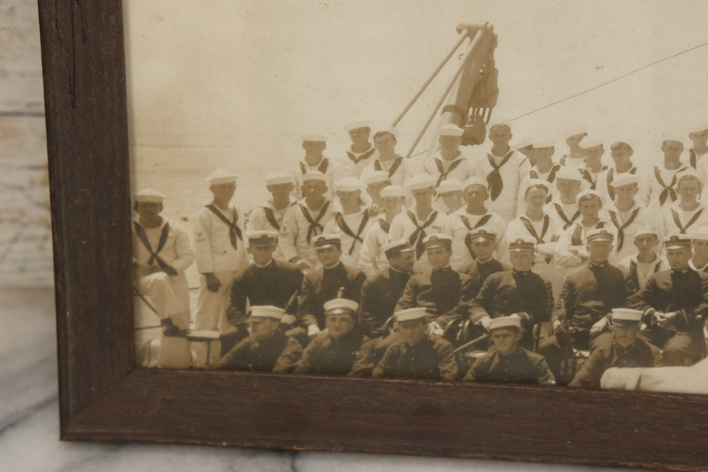 Lot 021 - Antique Framed Photograph Of The Crew Of A U.S. Navy Battleship With Sailors And Officers On Deck, With Gun Turret, 20-1/2" x 12-1/4"