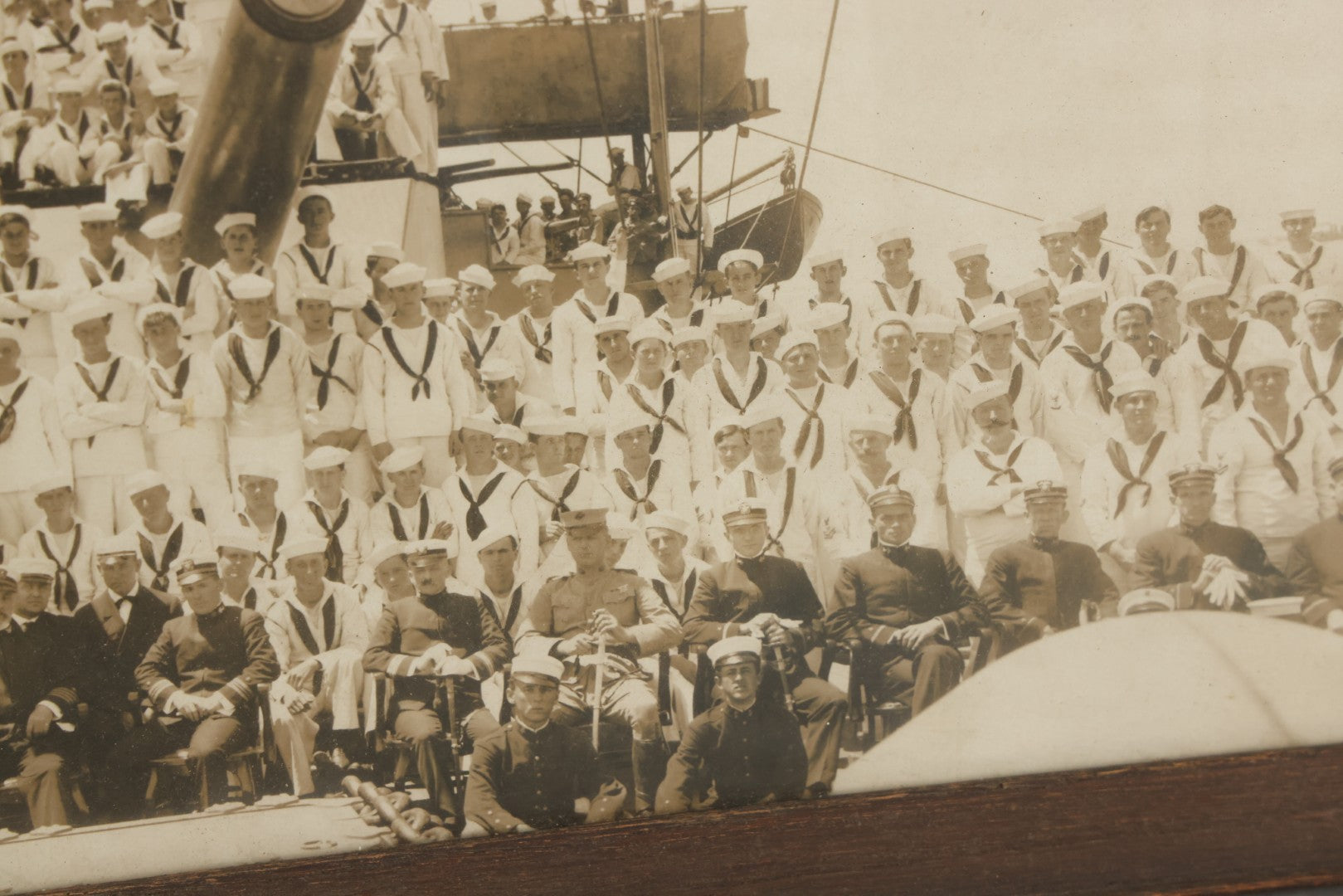 Lot 021 - Antique Framed Photograph Of The Crew Of A U.S. Navy Battleship With Sailors And Officers On Deck, With Gun Turret, 20-1/2" x 12-1/4"