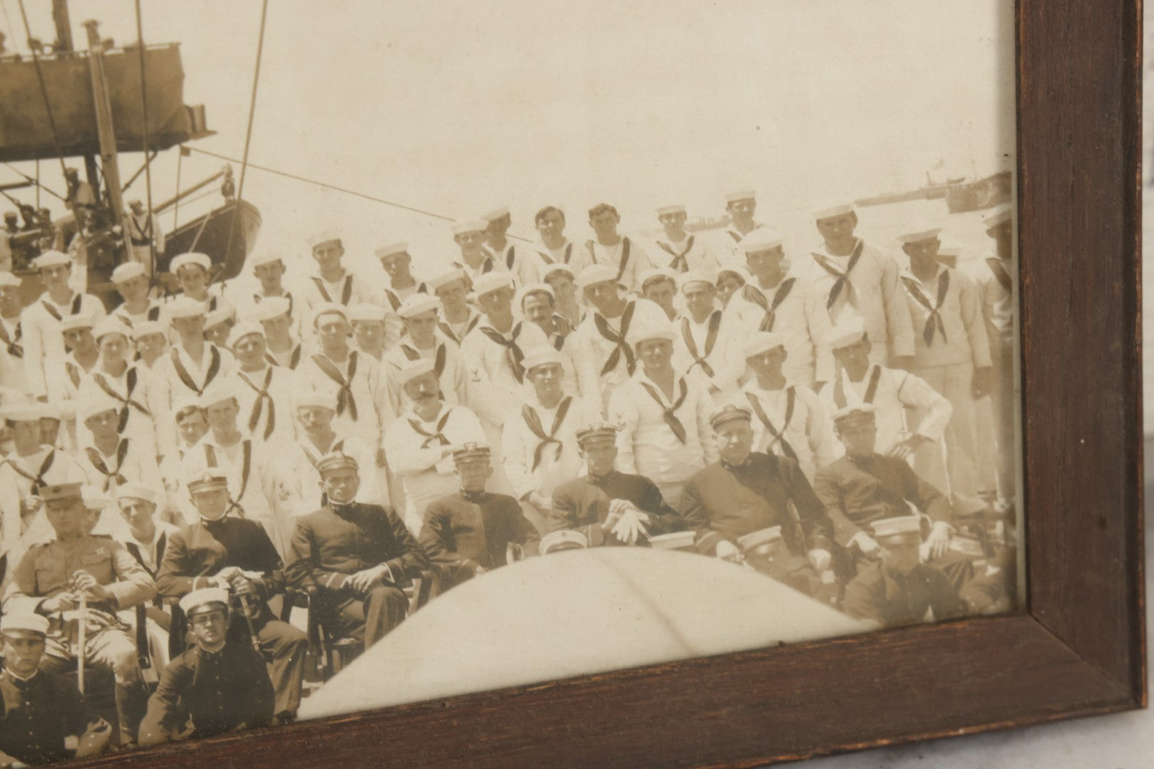 Lot 021 - Antique Framed Photograph Of The Crew Of A U.S. Navy Battleship With Sailors And Officers On Deck, With Gun Turret, 20-1/2" x 12-1/4"