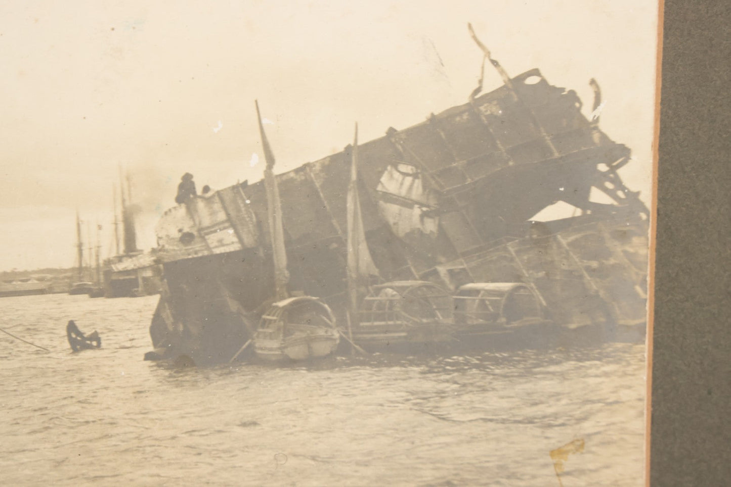 Lot 022 - Antique Boarded Photograph Of The Aftermath Of The Sinking Of The U.S.S. Maine, Havana Harbor, Cuba, 1898, Event That Sparked The Spanish-American War, 17" x 13-1/4"