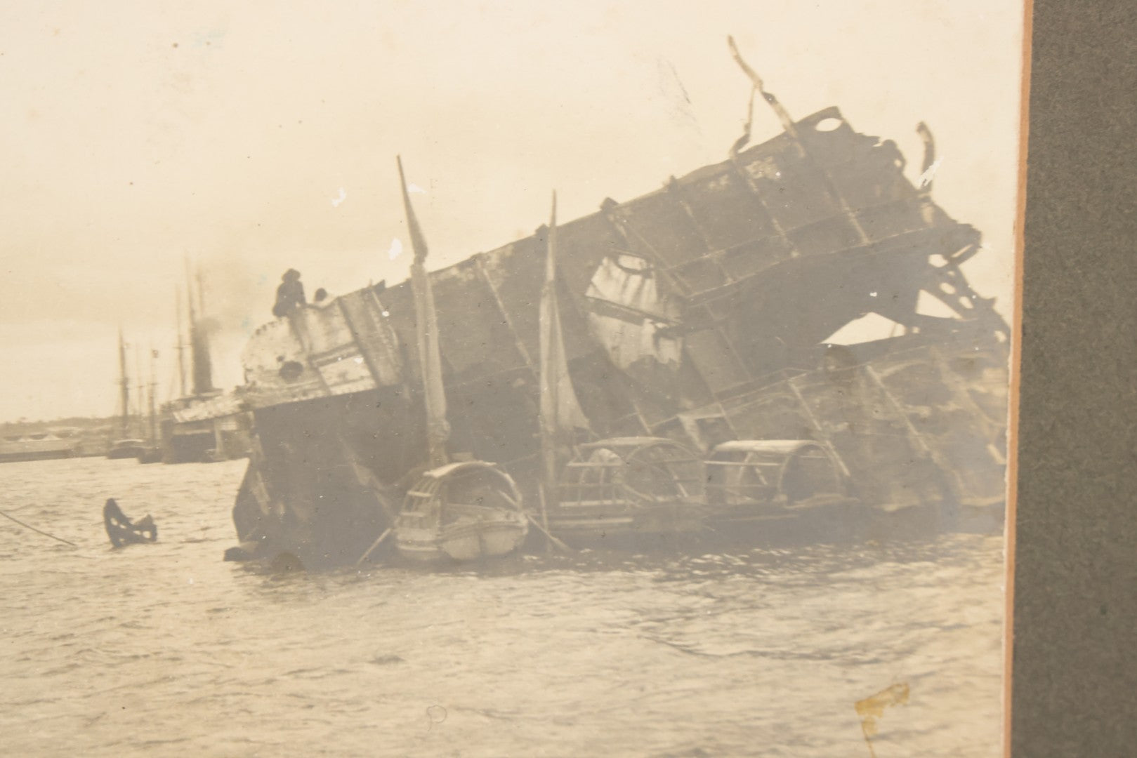 Lot 022 - Antique Boarded Photograph Of The Aftermath Of The Sinking Of The U.S.S. Maine, Havana Harbor, Cuba, 1898, Event That Sparked The Spanish-American War, 17" x 13-1/4"