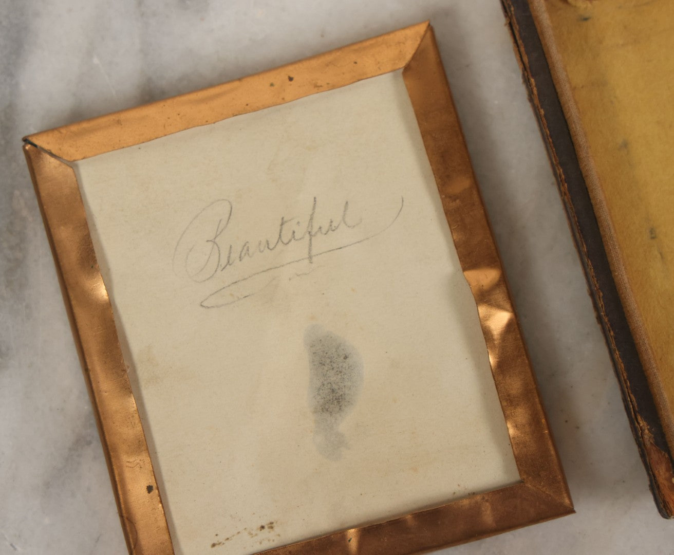 Lot 029 - Antique 1/6th Plate Ambrotype Photograph Of A Young Woman Identified Only As "Beautiful" With Handwritten Note On Verso, In Half Leatherette Union Case, With Faint Tinting
