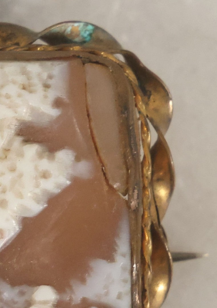 Lot 038 - Antique Shell Cameo Brooch Pin With A Scene Of A Woman Walking Beside A Stone Building, Village With Trees, Note Crack Upper Right, Missing Pin Stay