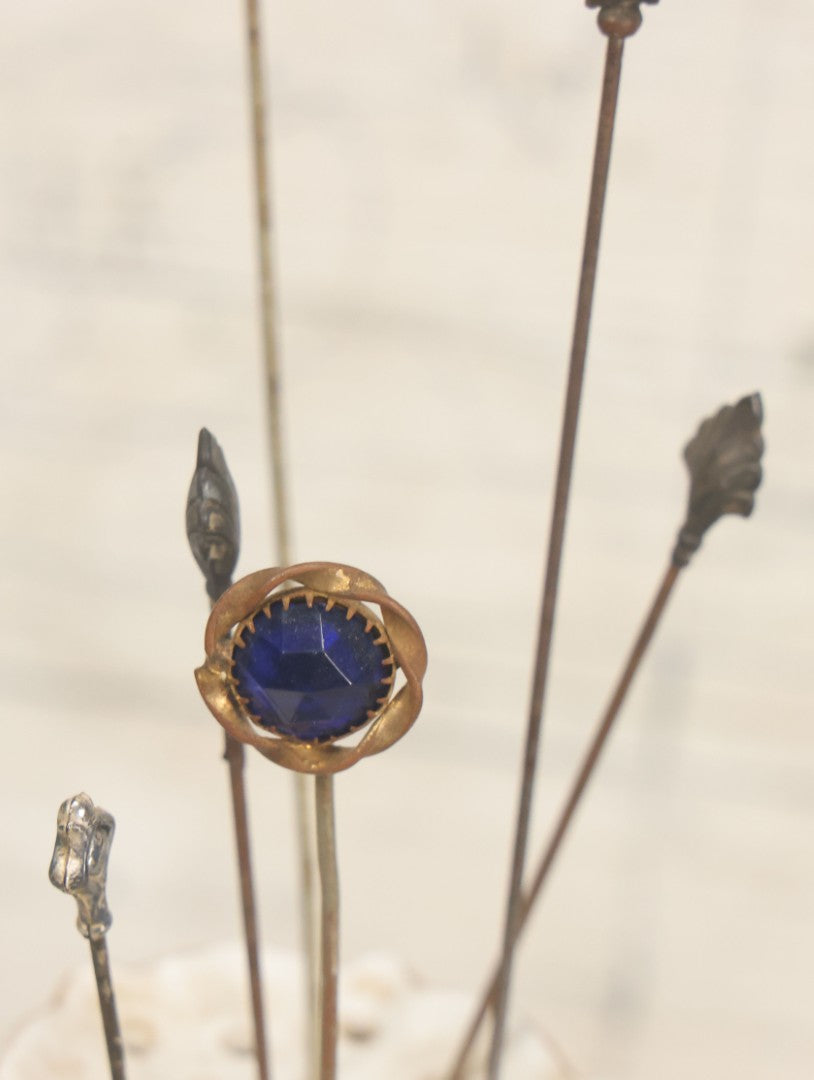 Lot 040 - Grouping Of Twelve Antique Hat Pins And Two Porcelain Hat Pin Holders, Including Some With Sterling, Blue Gem, Art Nouveau, And More