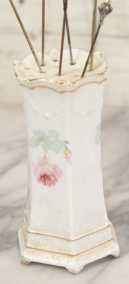 Lot 040 - Grouping Of Twelve Antique Hat Pins And Two Porcelain Hat Pin Holders, Including Some With Sterling, Blue Gem, Art Nouveau, And More