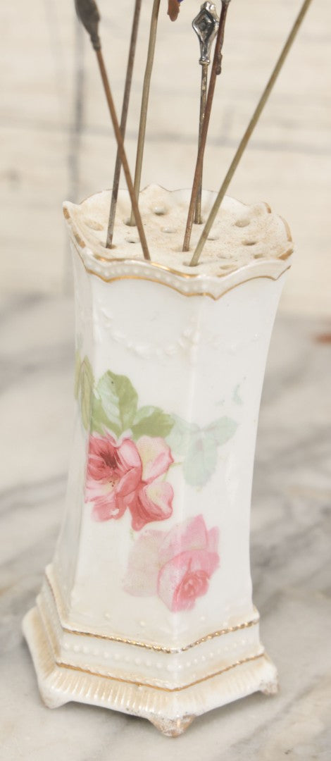 Lot 040 - Grouping Of Twelve Antique Hat Pins And Two Porcelain Hat Pin Holders, Including Some With Sterling, Blue Gem, Art Nouveau, And More