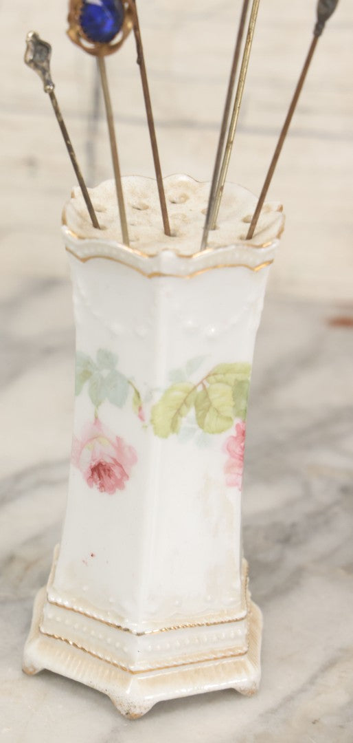 Lot 040 - Grouping Of Twelve Antique Hat Pins And Two Porcelain Hat Pin Holders, Including Some With Sterling, Blue Gem, Art Nouveau, And More