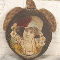Lot 048 - Antique Hand Painted Die Cut Turtle Painting Board With Image Of A Woman In A Hat Surrounded By Daisies, Note Wear To Turtle's Neck