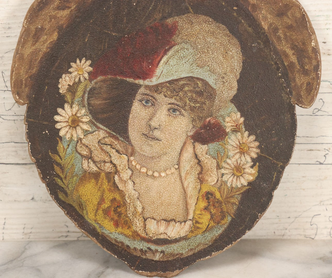 Lot 048 - Antique Hand Painted Die Cut Turtle Painting Board With Image Of A Woman In A Hat Surrounded By Daisies, Note Wear To Turtle's Neck