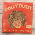 Lot 050 - Vintage Dolly Duzit Sanitary Golden Sponge In Original Box With Cartoon Dolly Mascot, Manufactured By Springfield Wire And Tinsel Company, West Springfield, Massachusetts