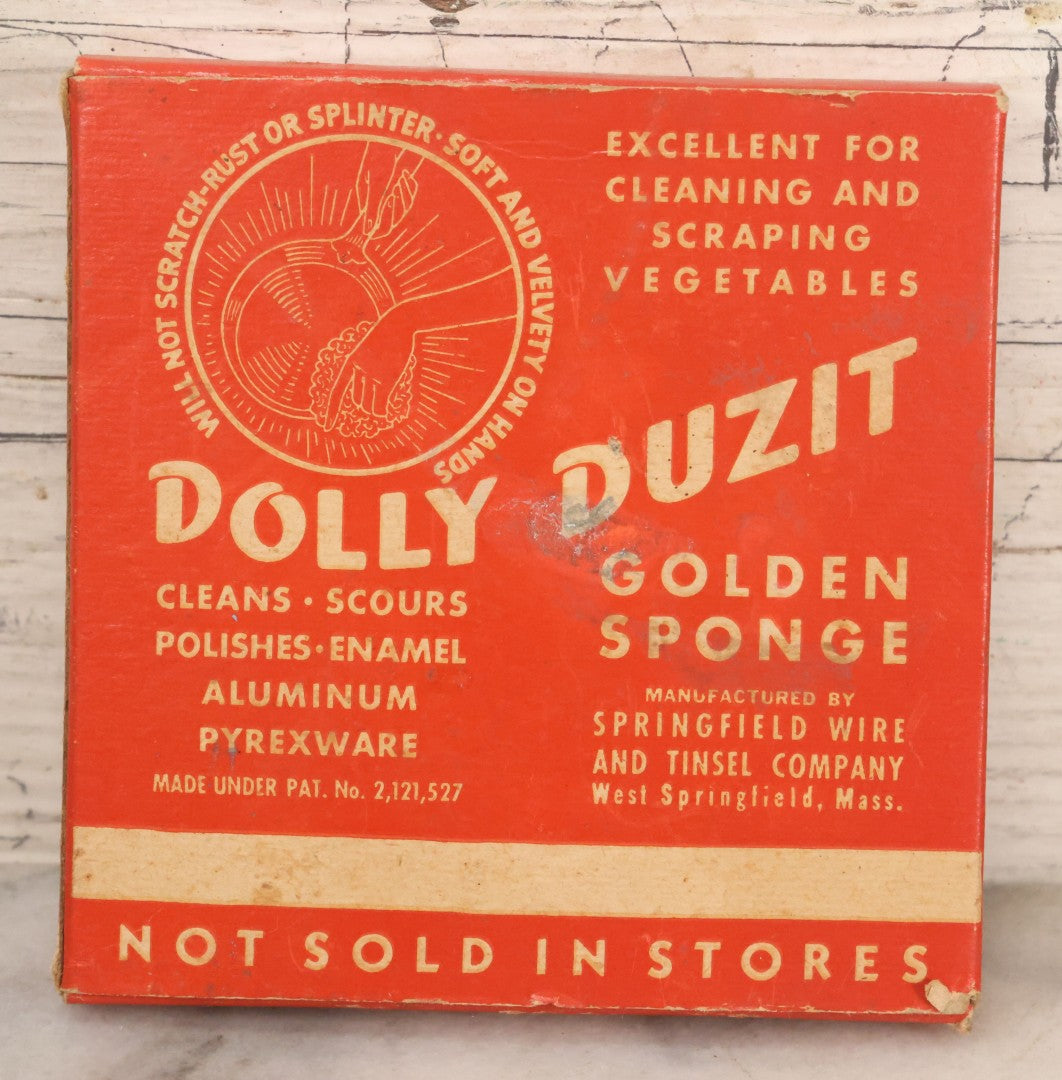 Lot 050 - Vintage Dolly Duzit Sanitary Golden Sponge In Original Box With Cartoon Dolly Mascot, Manufactured By Springfield Wire And Tinsel Company, West Springfield, Massachusetts