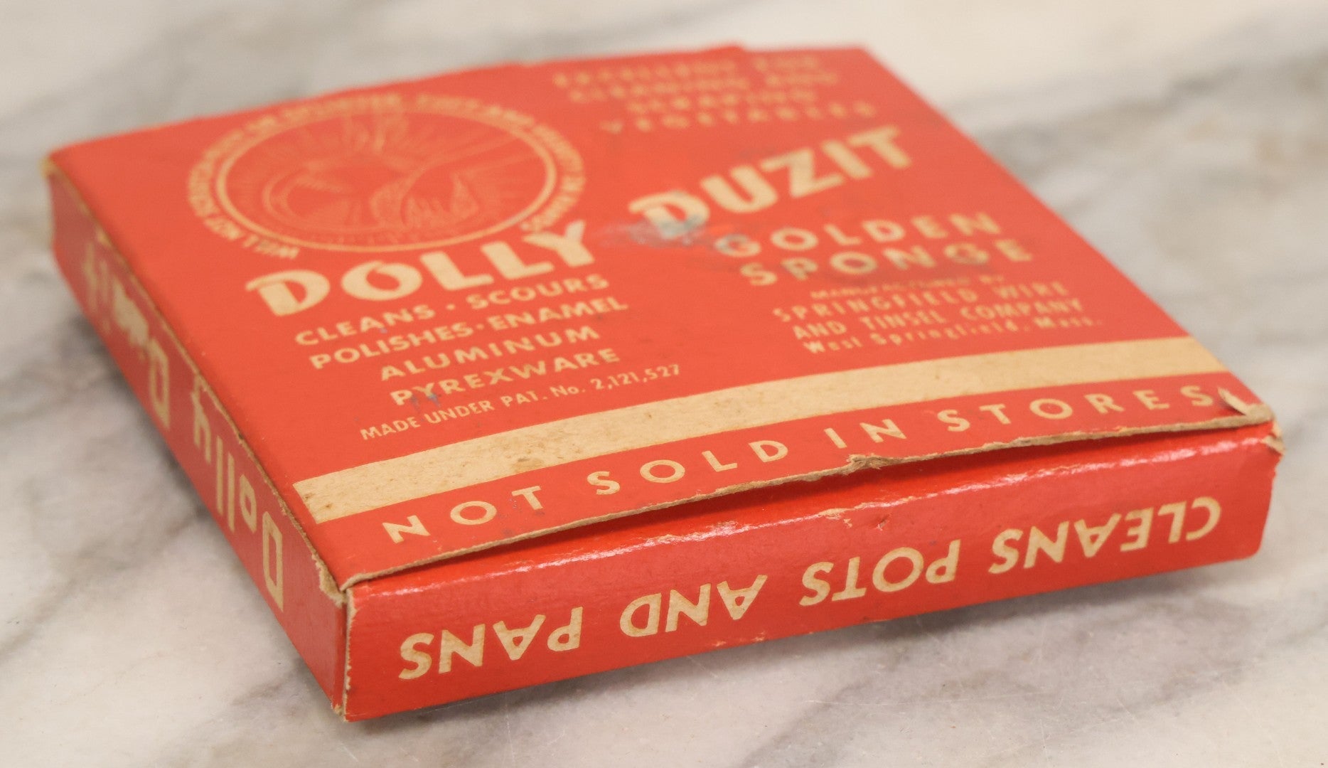Lot 050 - Vintage Dolly Duzit Sanitary Golden Sponge In Original Box With Cartoon Dolly Mascot, Manufactured By Springfield Wire And Tinsel Company, West Springfield, Massachusetts
