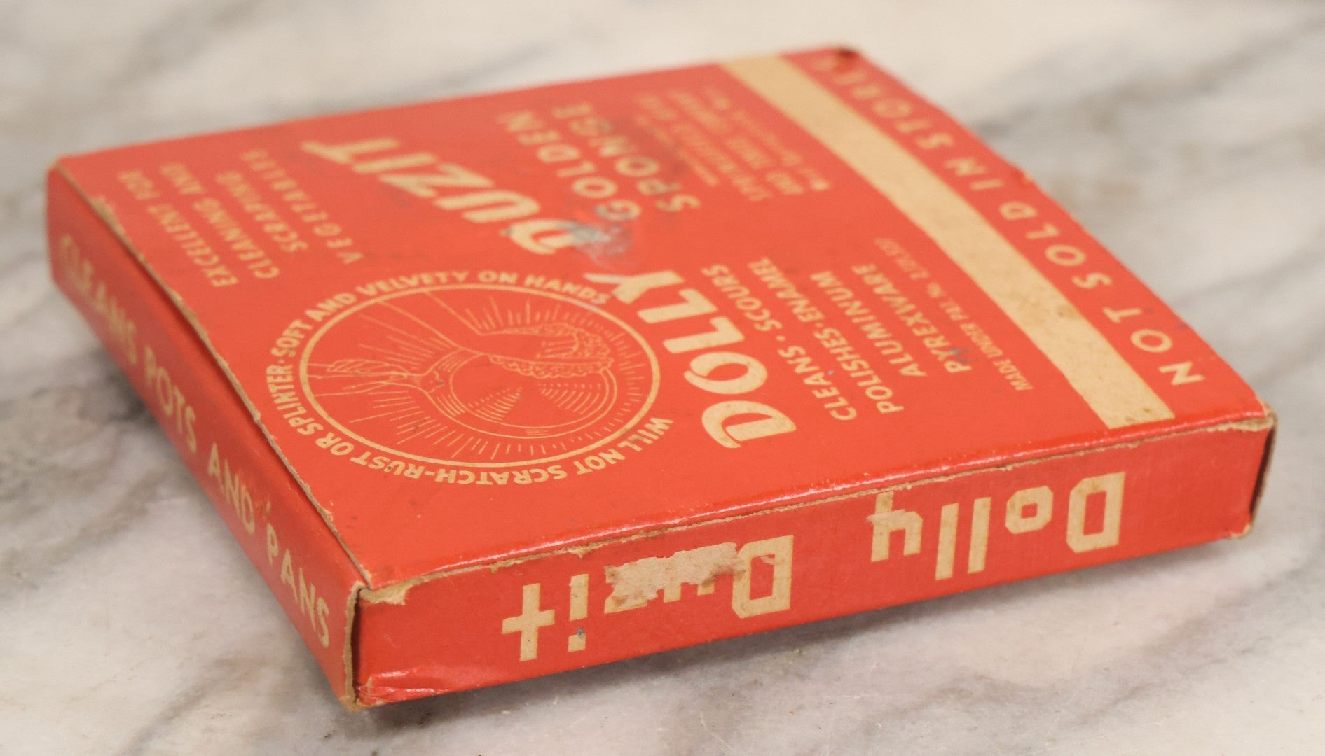 Lot 050 - Vintage Dolly Duzit Sanitary Golden Sponge In Original Box With Cartoon Dolly Mascot, Manufactured By Springfield Wire And Tinsel Company, West Springfield, Massachusetts