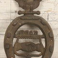 Lot 053 - Antique Cast Iron Horseshoe With Shaking Hands Motif, Eagle, "Good Luck," With Wall Mounting Holes